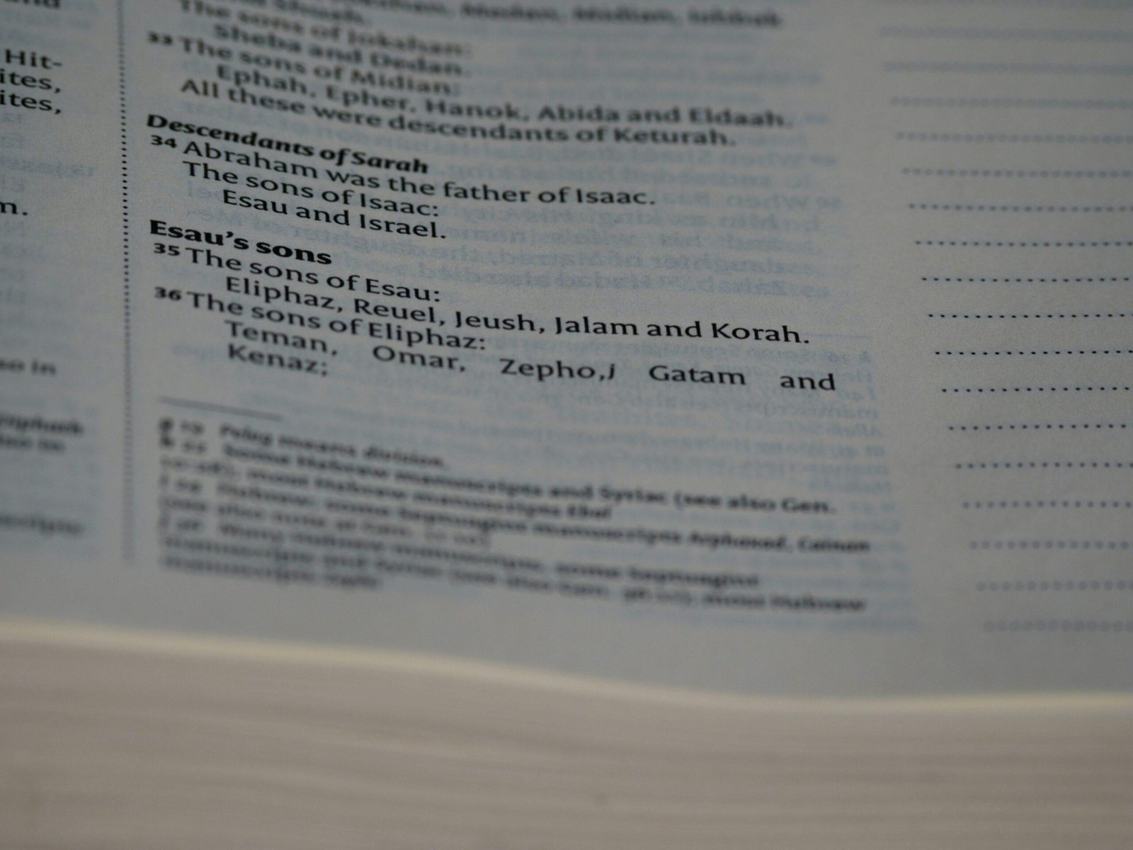 A cup of coffee sitting next to a convention planner notebook