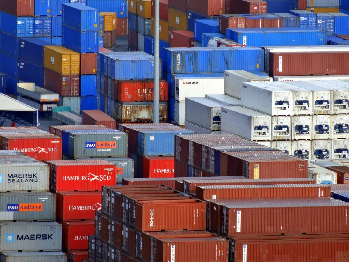 Before-and-after images showing damaged goods and restored booth after claiming insurance.